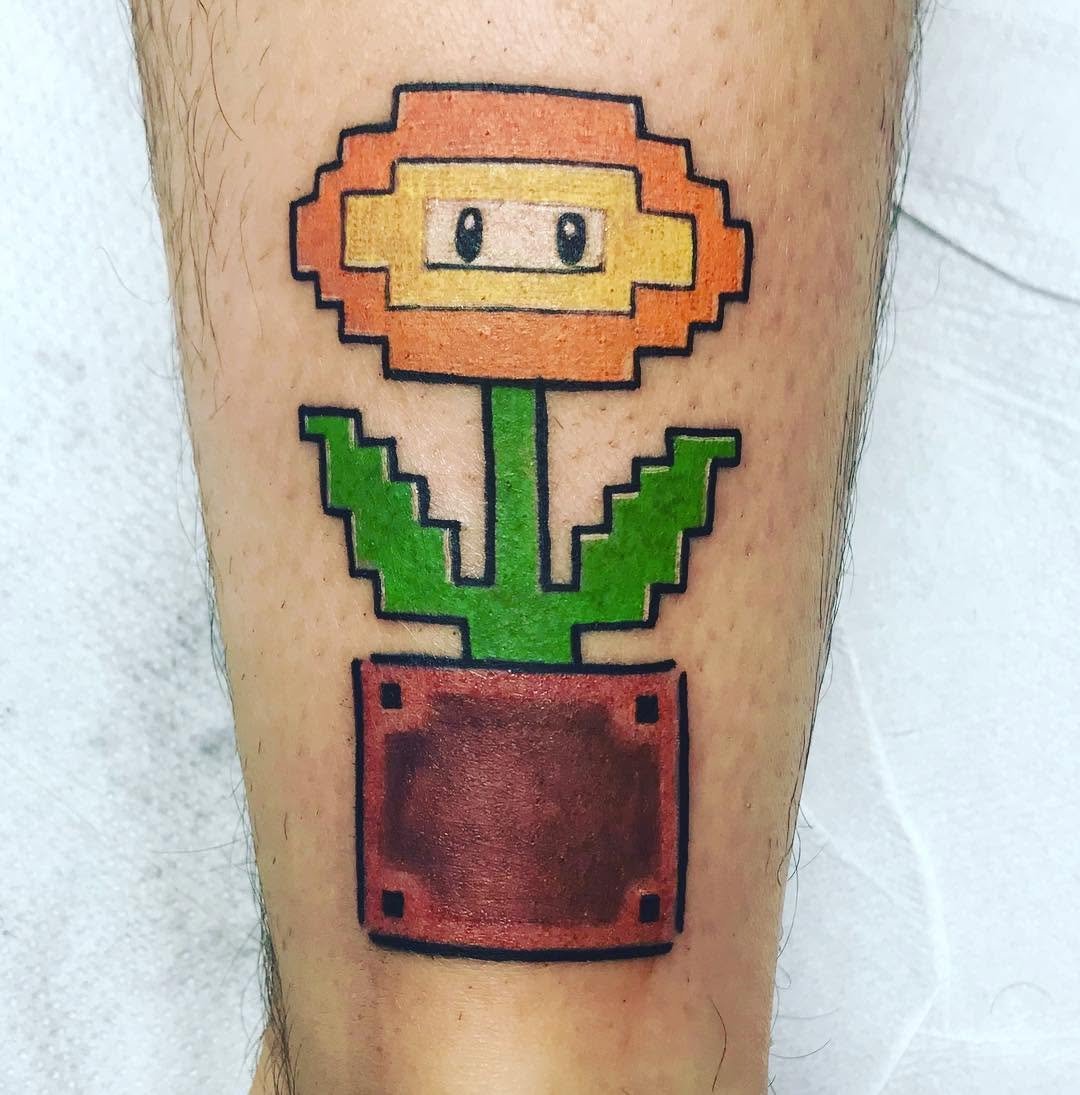 Fire flower. Flor de fuego de Super Mario Bros fireflowermariobrosnintendo martink_tattoodoshermanas montequintotattoo 8bitscooltattoos tatcolorscolortattoolittletattoo istinkflordefuegogamersgamestbtsvq funpicoftheday