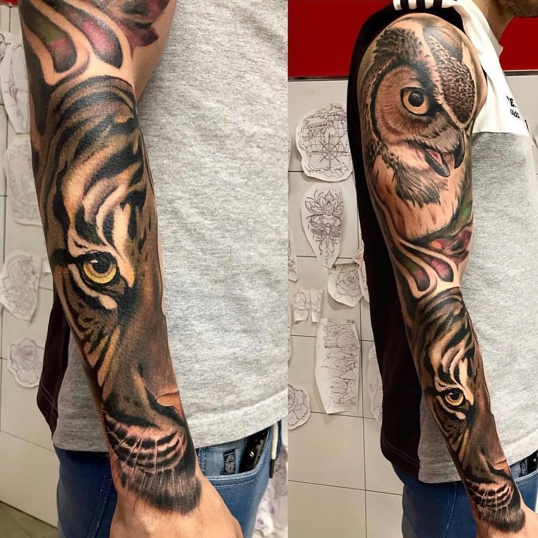 Tatuaje profesional en estudio MartinK Tattoo de un tigre y un búho