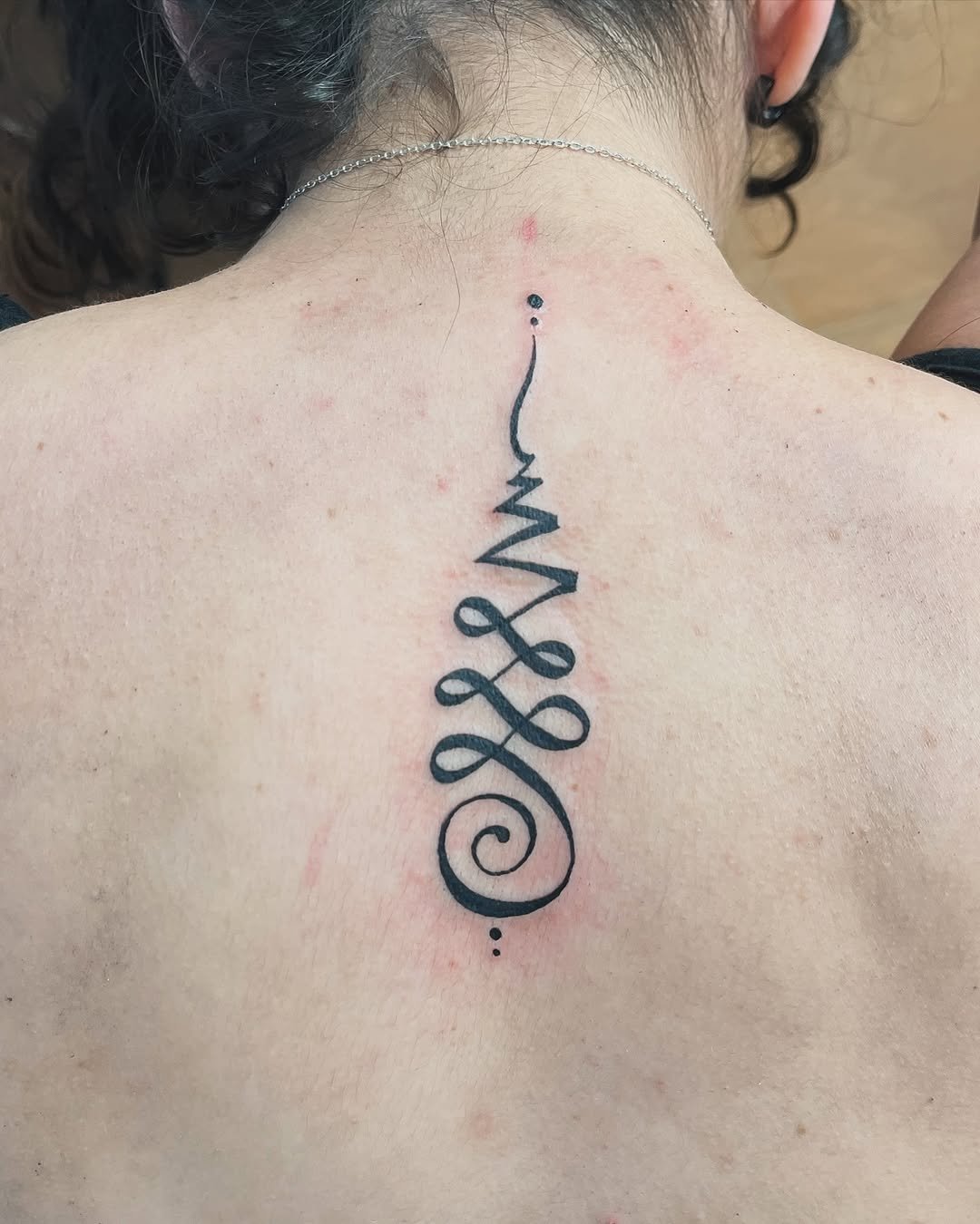 Tatuaje profesional en estudio MartinK Tattoo del El camino hacia la sabiduría según el budismo